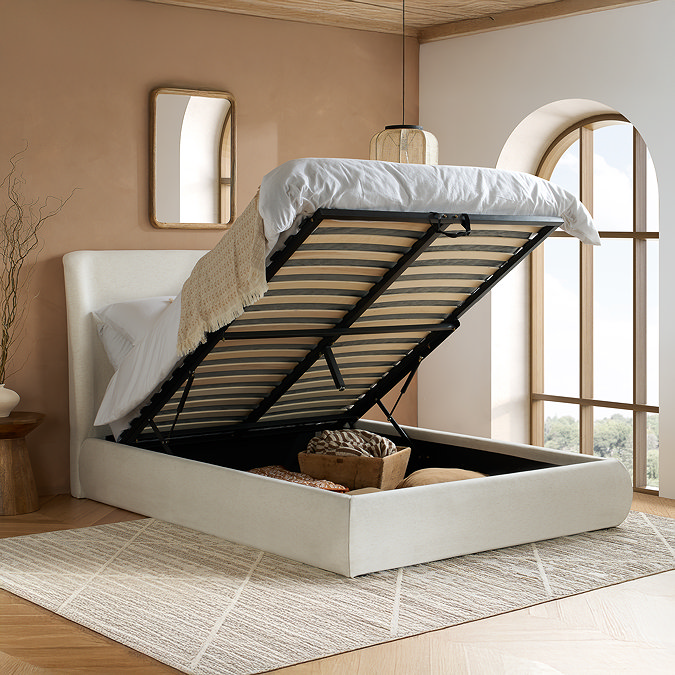 image of linen double ottoman bed with top lifted up to show storage underneath