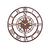 image cut out on white background of round bronze clock with central compass motif and gold hands