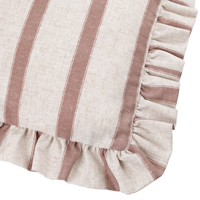 close up on corner of pink striped cushion