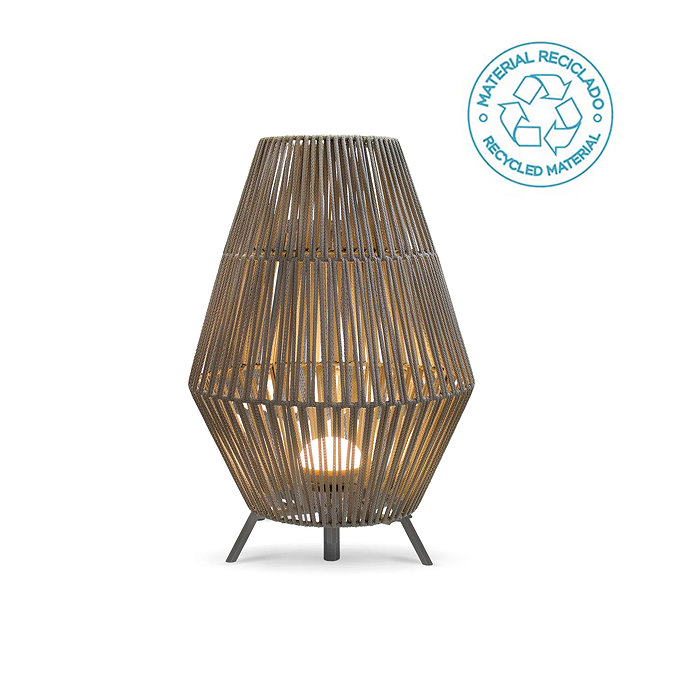 image cut out on white background of rope floor lamp emitting warm white light from within