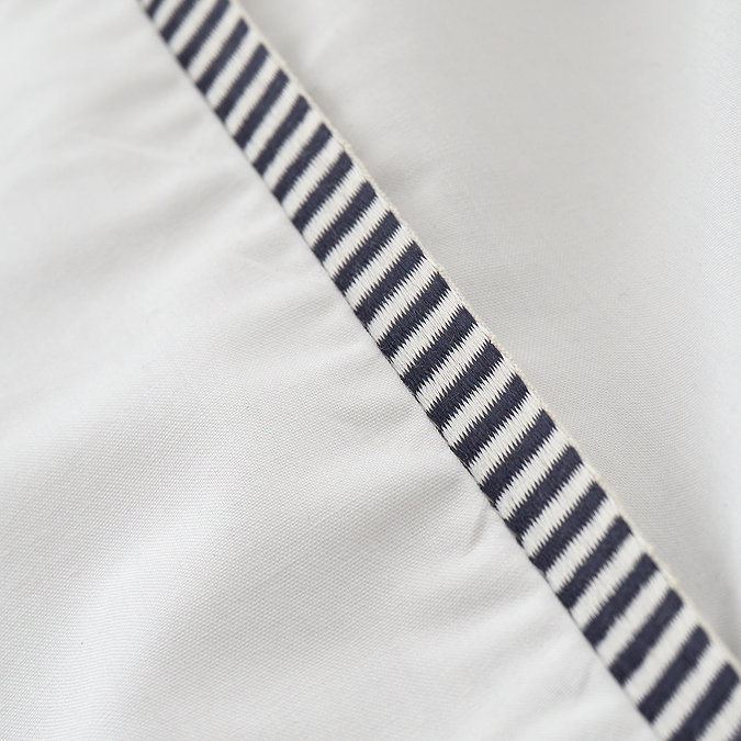 Contrast trim duvet cover set in white and black close up image 5