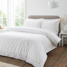 contrast trim natural and white on bed image 1