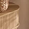 close up on rounded, smooth edge of the oak copenhagen console table with fluted drawer