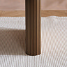 close up image of fluted legs of oval dining table