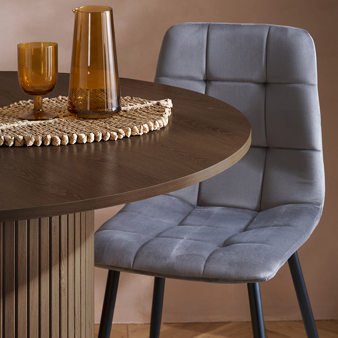 close up image of smooth round top of fluted dining table