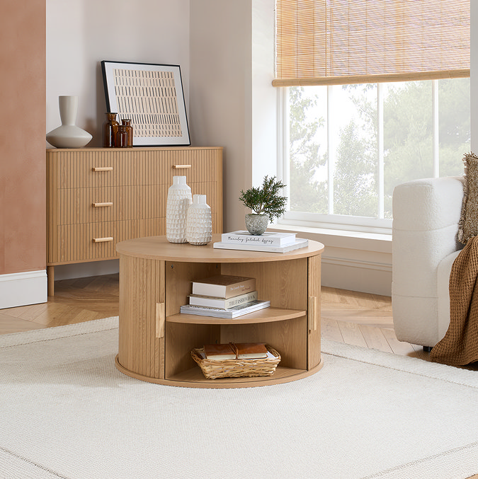 image of round coffee table with doors open to show storage within