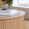 close up image of smooth oak top of oak effect coffee table with fluted base