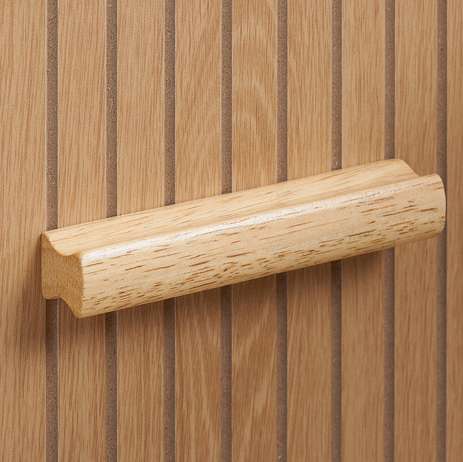 close up on horizontal wooden handle on bedside table