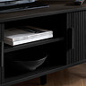 close up image on middle shelf of black wood effect tv unit