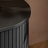 close up image of smooth top of black fluted tv unit