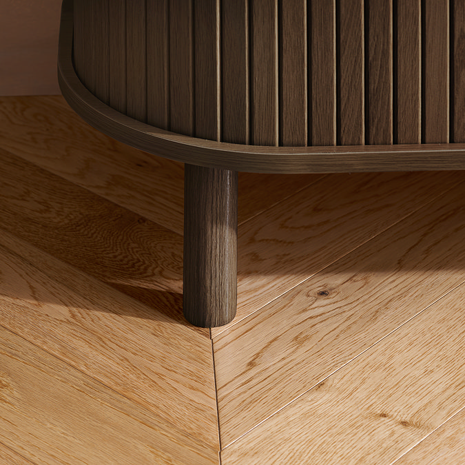 close up on walnut coloured wood legs of tv stand, on light wood floor