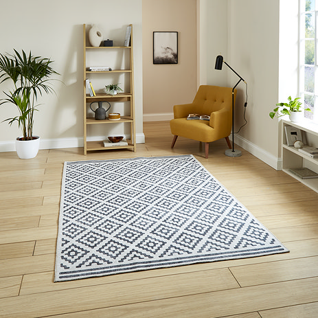 Coral Rug on floor image 1