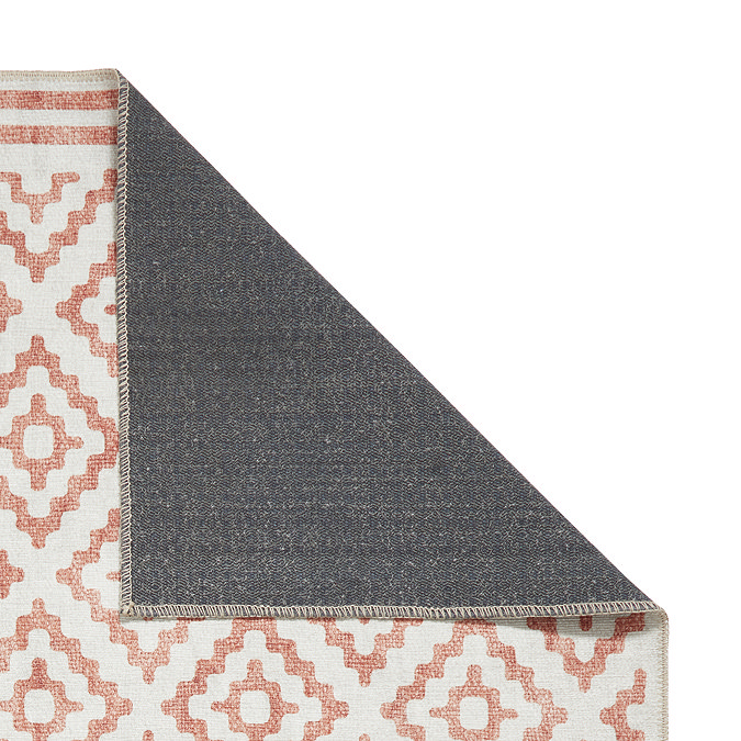 Coral orange rug close up image 4