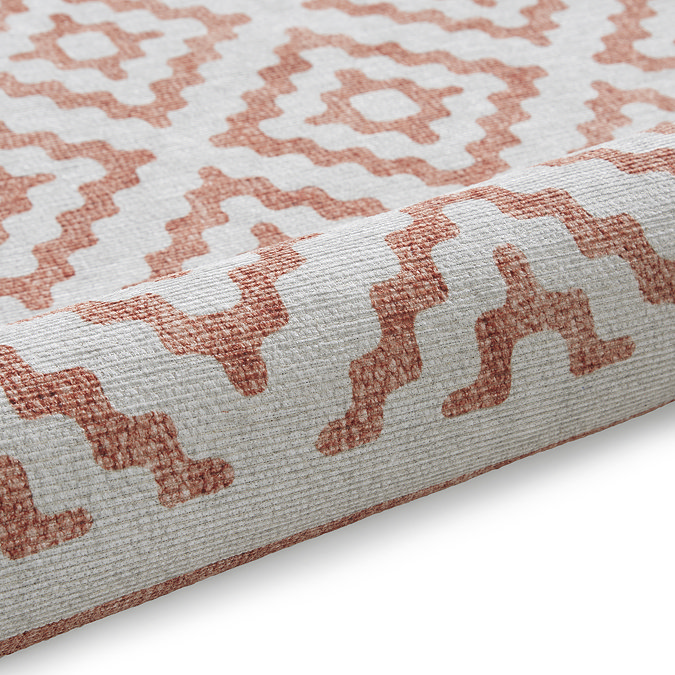 Coral orange rug close up image 9