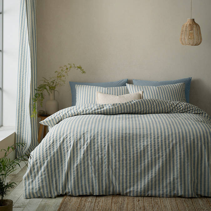 Cotton rich woven stripe blue on bed image 1