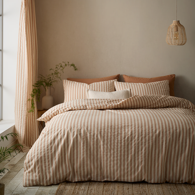 Cotton rich woven stripe clay on bed image 1