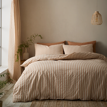 Cotton rich woven stripe clay on bed image 1