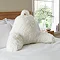 Cuddly shaggy faux fur chair cushion in cream on bed image 1