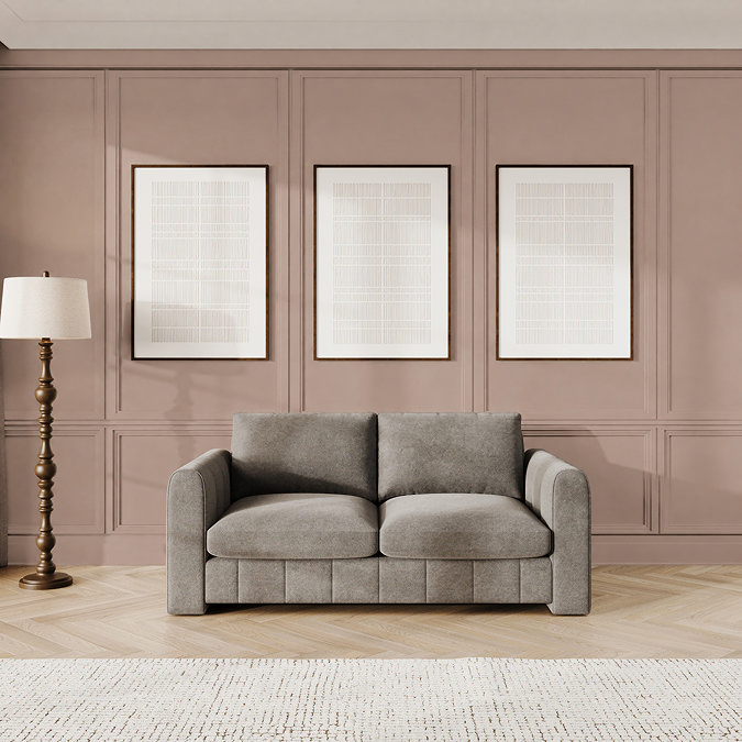 lifestyle image of platinum grey velvet contemporary medium sofa