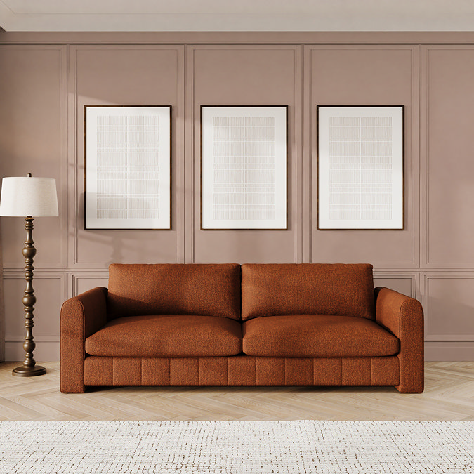 lifestyle image of mandarin orange contemporary grand sofa