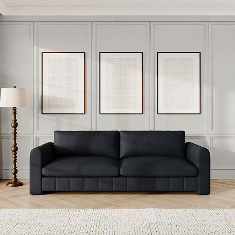 lifestyle image of midnight blue contemporary grand sofa