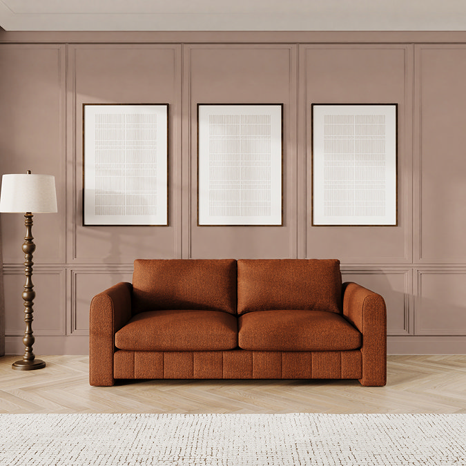lifestyle image of mandarin coloured contemporary large sofa