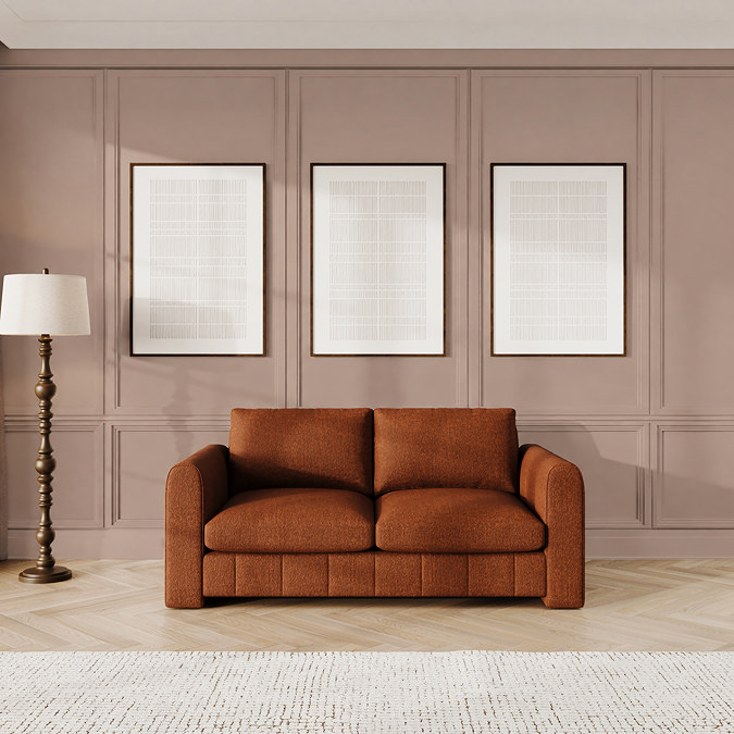 lifestyle image of mandarin orange contemporary medium sofa