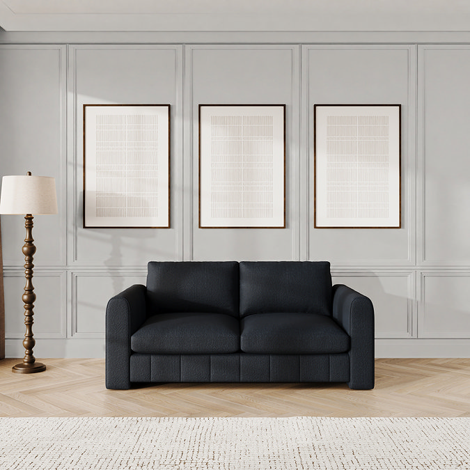 lifestyle image of midnight blue contemporary medium sofa