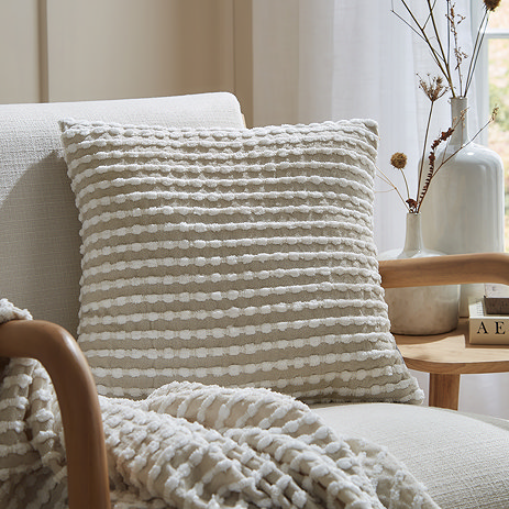 Darby Embroidered Cushion Natural Front View on Chair