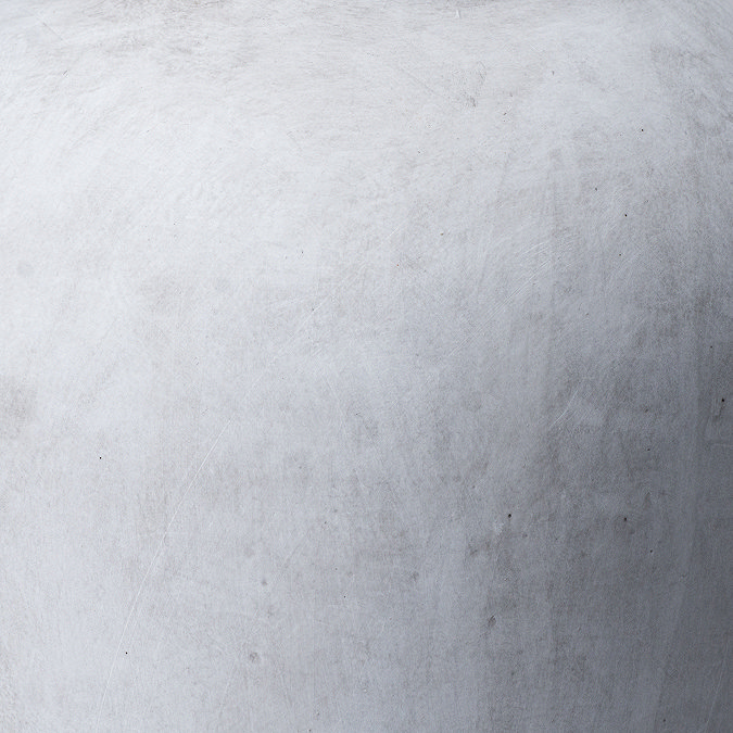 close up image of stone material of grey vase