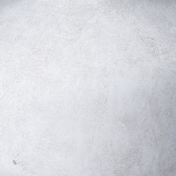 close up image of texture and colour of stone grey vase