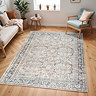 image of blue and brown vintage rug on light wood floor of a modern apartment