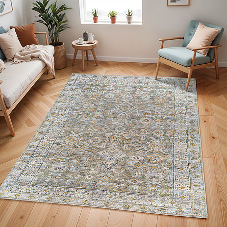 image of sage green and brown vintage style rug on light wood flooring of modern apartment