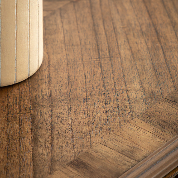 close up image of smooth wooden finish of mindi wood sideboard