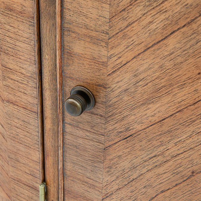 close up image of bronze beehive pull handle of mindi wood sideboard