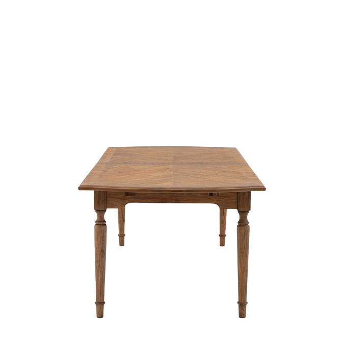 front on image cut out on white background of mindi wood rectangular dining table with slim carved legs