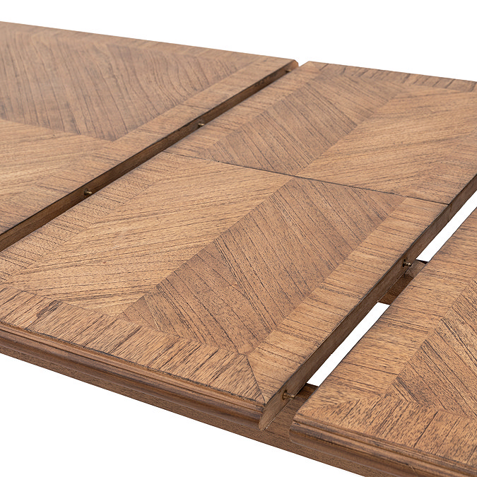 close up image on middle of rectangular dining table where it extends to create more space