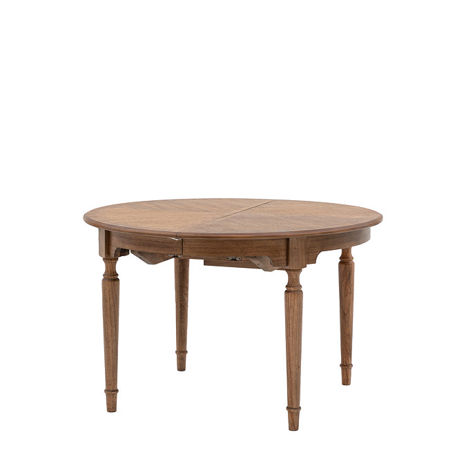 image cut out on white background of round solid wood dining table with slim rounded legs