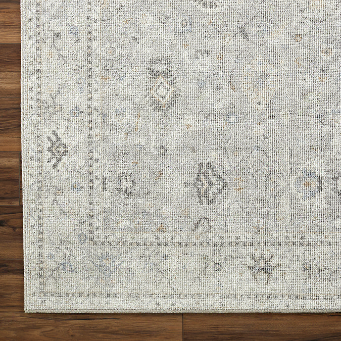 close up swatch image of grey floral vintage rug