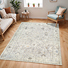 image of grey floral patterned vintage rug on light wooden flooring of modern apartment