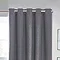 Close up on charcoal grey curtains eyelet style