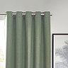 Close up on green curtains eyelet style