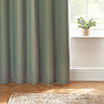Close up of green curtain brushing the floor