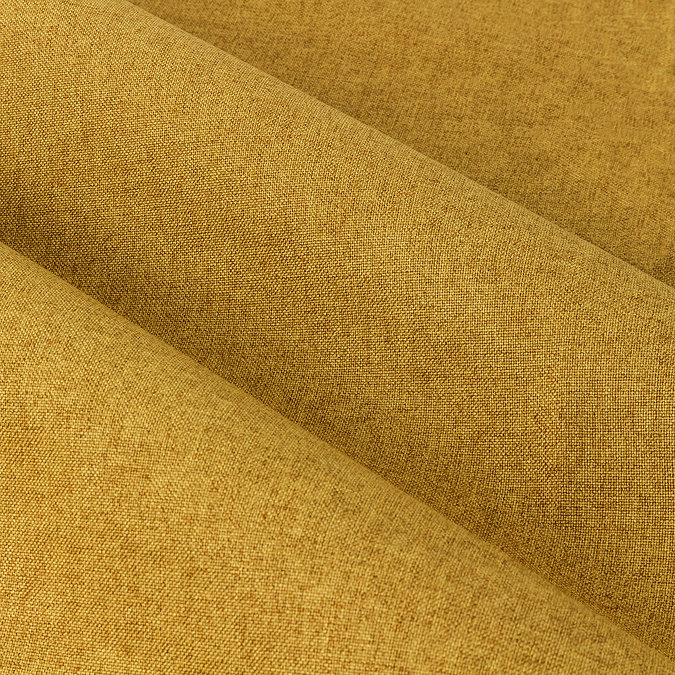 Close up of mustard yellow curtain texture
