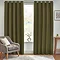 Olive green floor length curtains open in front of window in living room