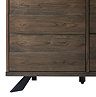 close up image on bottom of dark oak panelled sideboard with small black legs