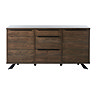 image cut out on white background of panelled dark oak sideboard with two doors on either side of middle three drawers
