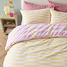 Lottie duvet cover set in yellow and pink on bed image 2