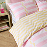 Lottie duvet cover set in yellow and pink close up on bed image 3