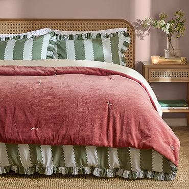edie rose bedspread on bed image 1